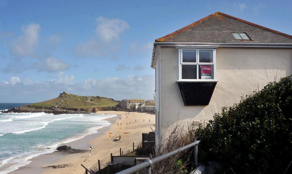  Sunset House sits on a hill overlooking the stunning Porthmeor beach in St Ives, Cornwall