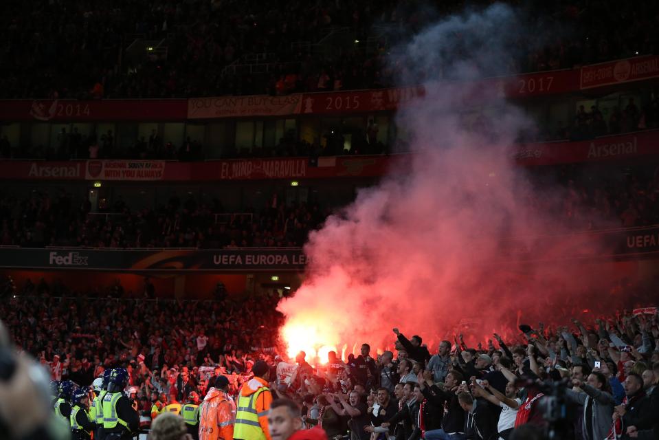  The German fans let off flares inside the ground as they claimed the lower tier