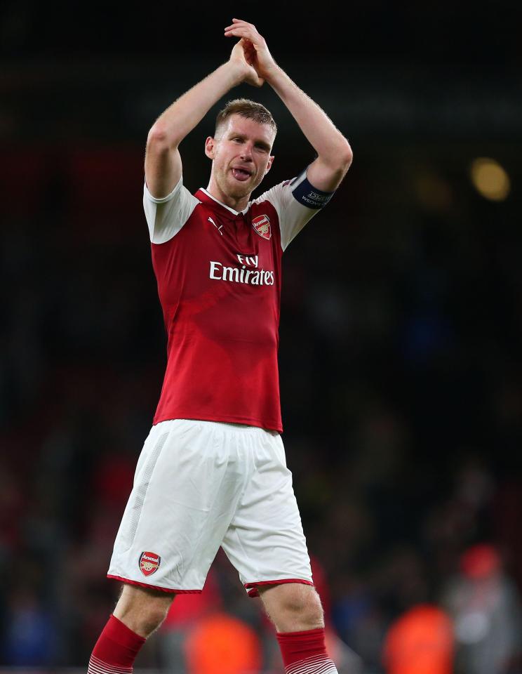  Per Mertesacker thanks the fans who stayed until the end of the match