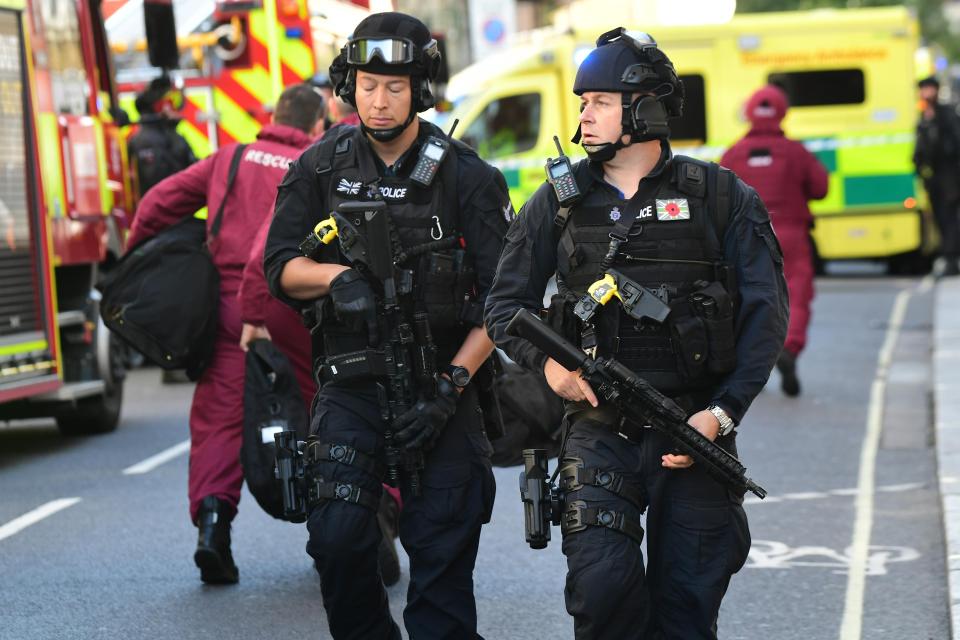  Armed cops were seen patrolling the streets in west London after the explosion this morning