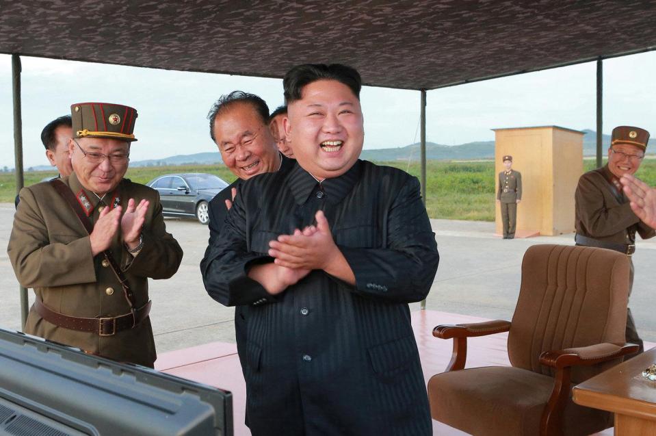  Kim Jong-un guided the missile as it was launched before celebrating