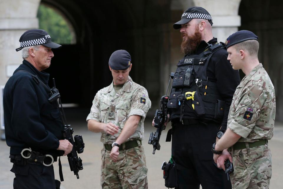  Officers with soldiers outside Horse Guards Parade in London