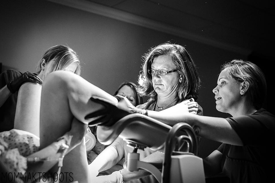  A nurse at Frankfort Regional Medical Center in Kentucky helps a woman through a long pushing phase of labour