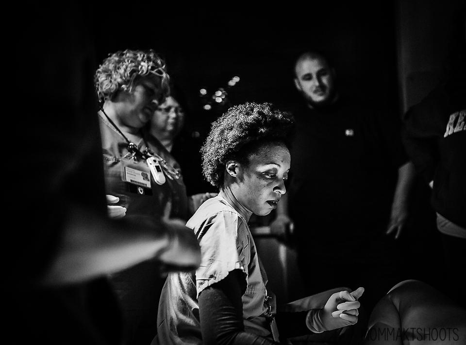  A group of nurses in Louisville wait for the arrival of a baby