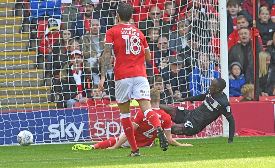  Albert Adomah punishes an error from keeper Adam Davies to put Villa 1-0 up