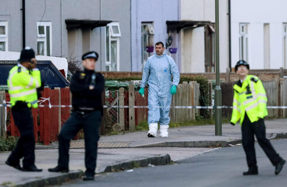  A forensic officer walks down Cavendish Road