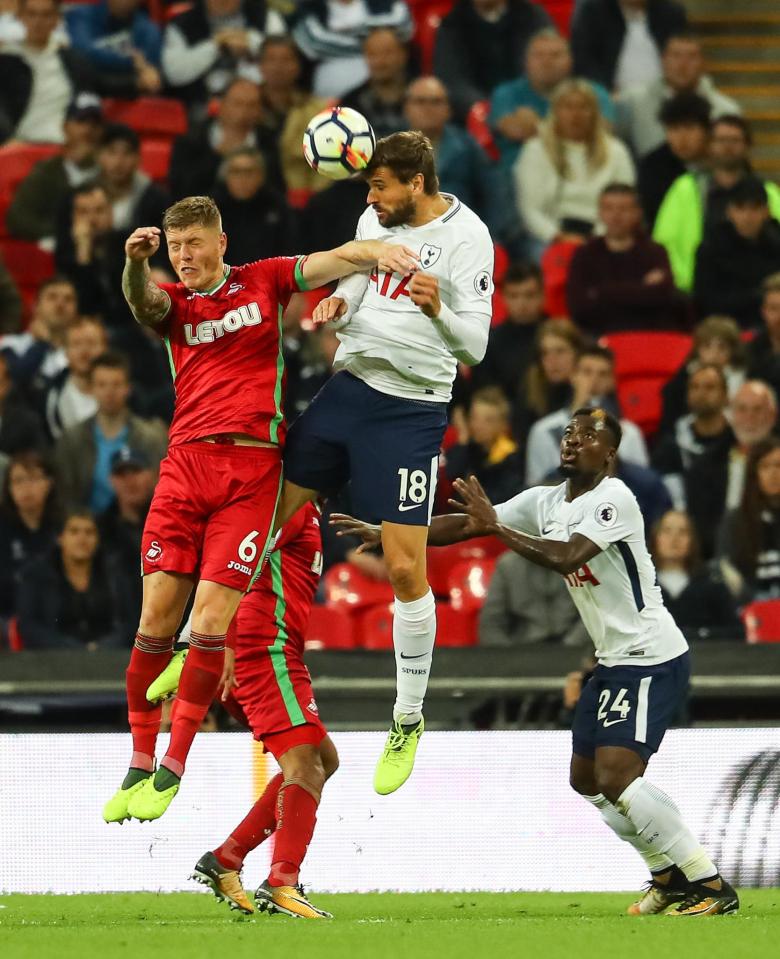  Fernando Llorente jumps for a high ball against Swansea's Alfie Mawson during Spurs' 0-0 draw with the Welsh club at Wembley