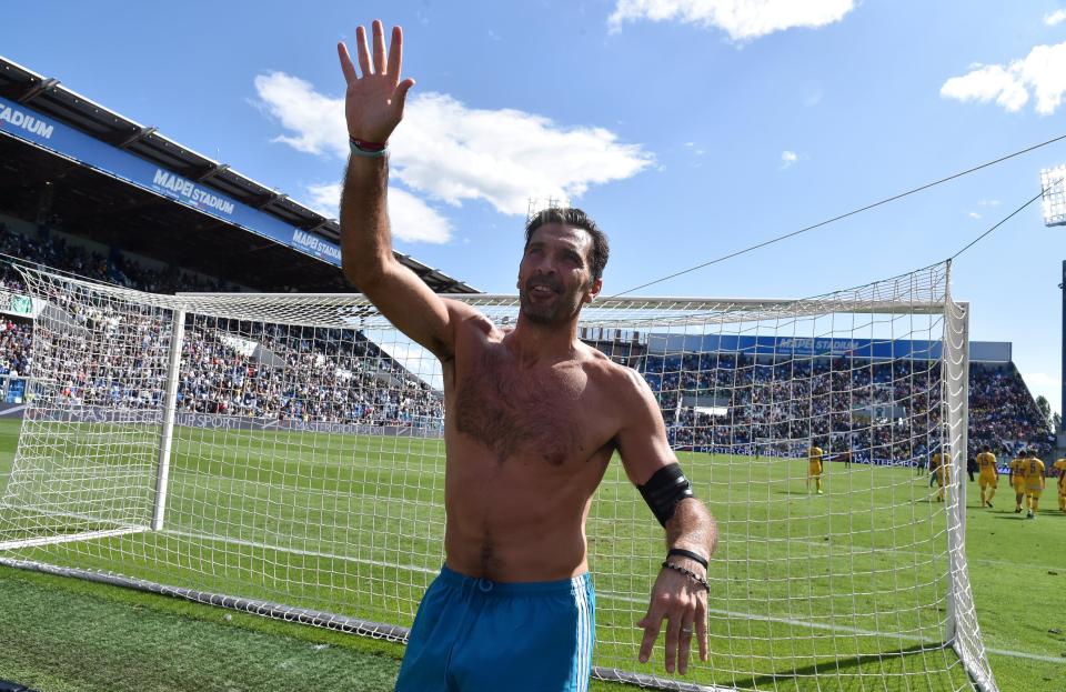  Gianluigi Buffon throws his shirt into Juventus fans at full-time of encounter