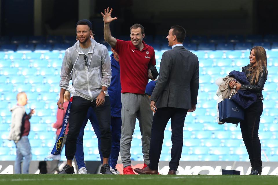  Former team-mate Petr Cech chats with Terry after the match