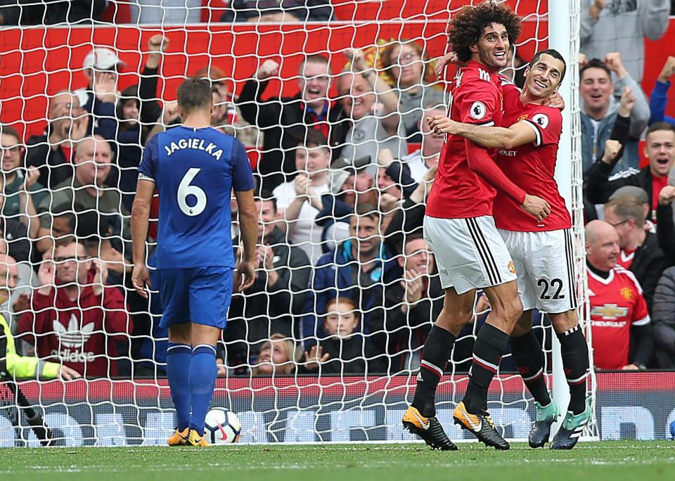  Belgium star Fellaini helped United to a 4-0 win over his former club