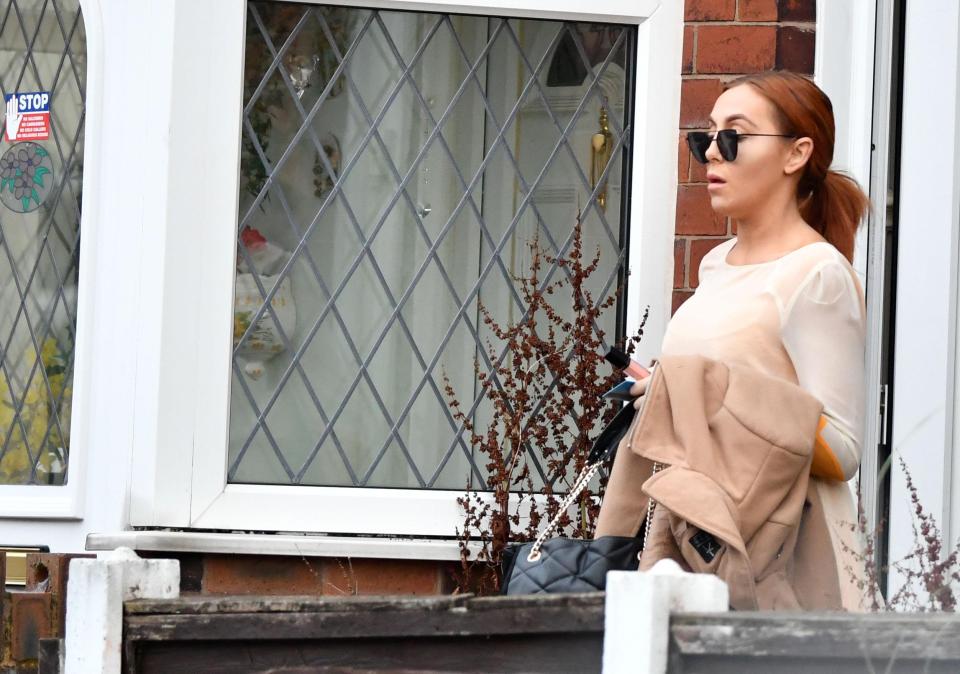  Wayne Rooney's party girl pal Laura Simpson was snapped leaving her home wearing large sunglasses