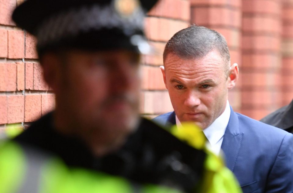  A huge amount of police officers were used to escort Rooney into the building