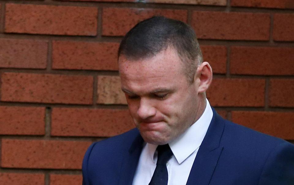  Wayne Rooney arrived at Stockport Magistrates Court with his head bowed