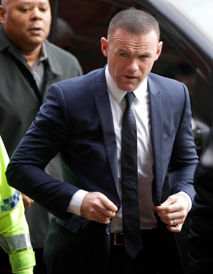  Rooney seen arriving at court still wearing his wedding ring amid the scandal