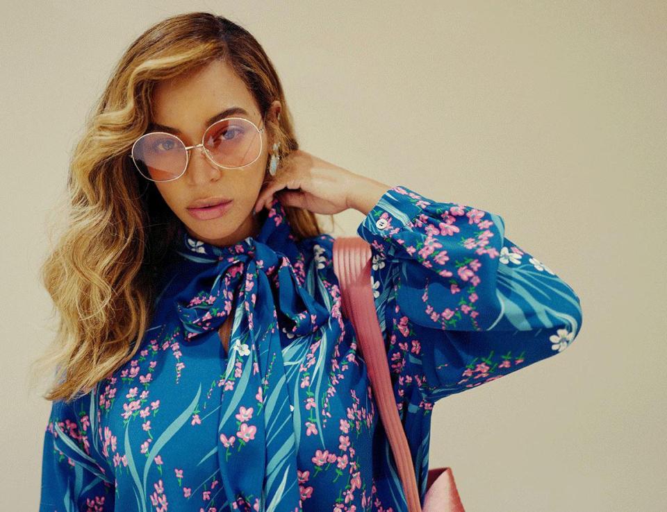  Beyonce accessorised with large rose-tinted shades