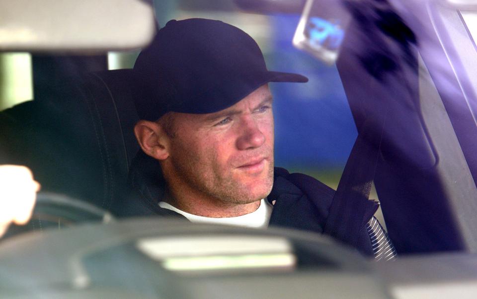  Wayne Rooney is driven into Everton's training ground the day after his court appearance