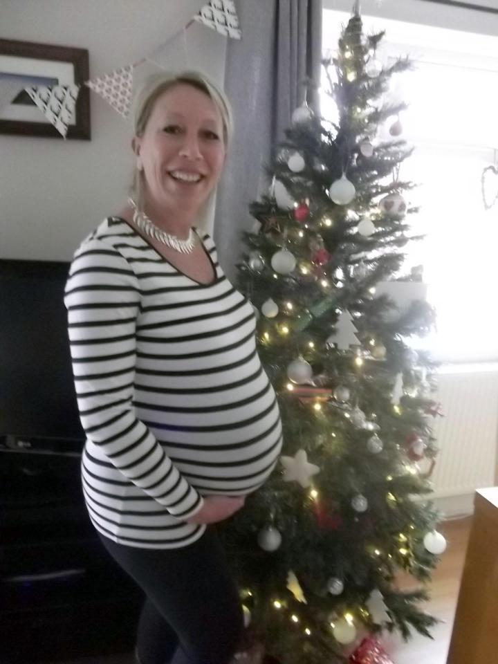  Overjoyed mum Tess proudly shows off her baby bump