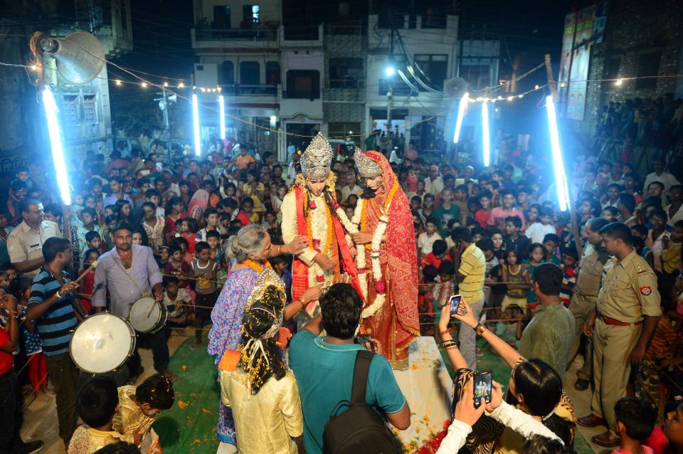  Indian artists dressed as Hindu gods Rama and Sita perform a traditional drama as they celebrate