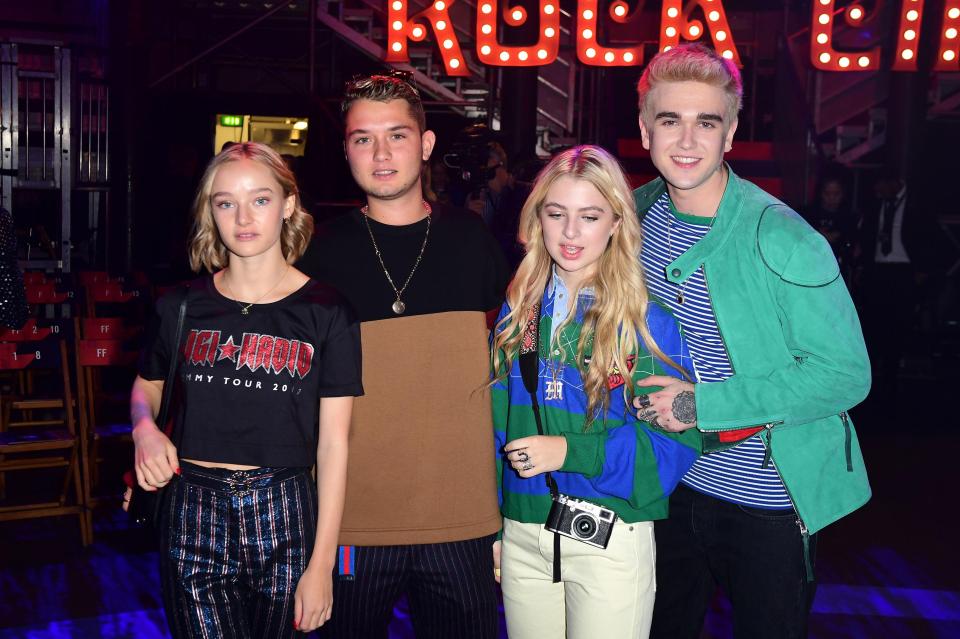  The young Primrose Hill set were also in attendance with Rafferty Law, second from left, Anais Gallagher, second from right, and Gabriel-Kane Day Lewis, far right, posing for pictures