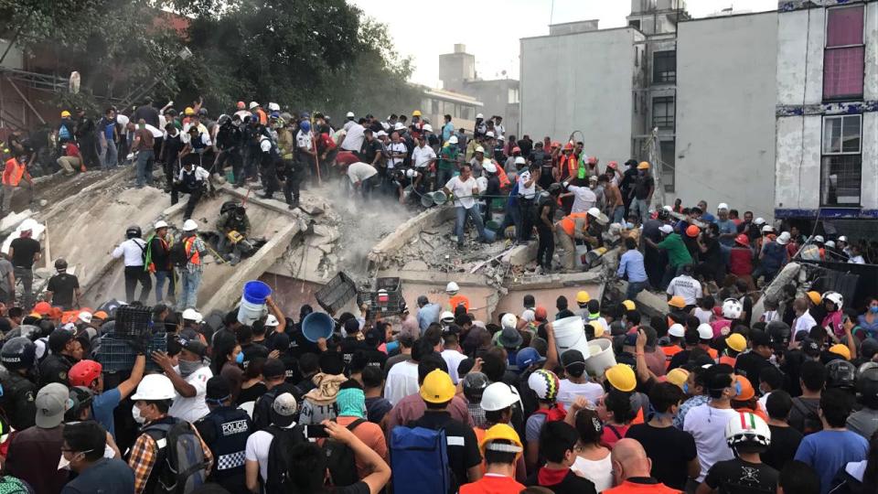  Rescue workers and volunteers attend to the rubble in search for survivors after a 7.1 earthquake hit Mexico