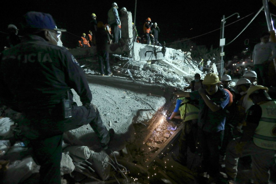 Emergency services desperately worked to pull people from the rubble after the powerful earthquake