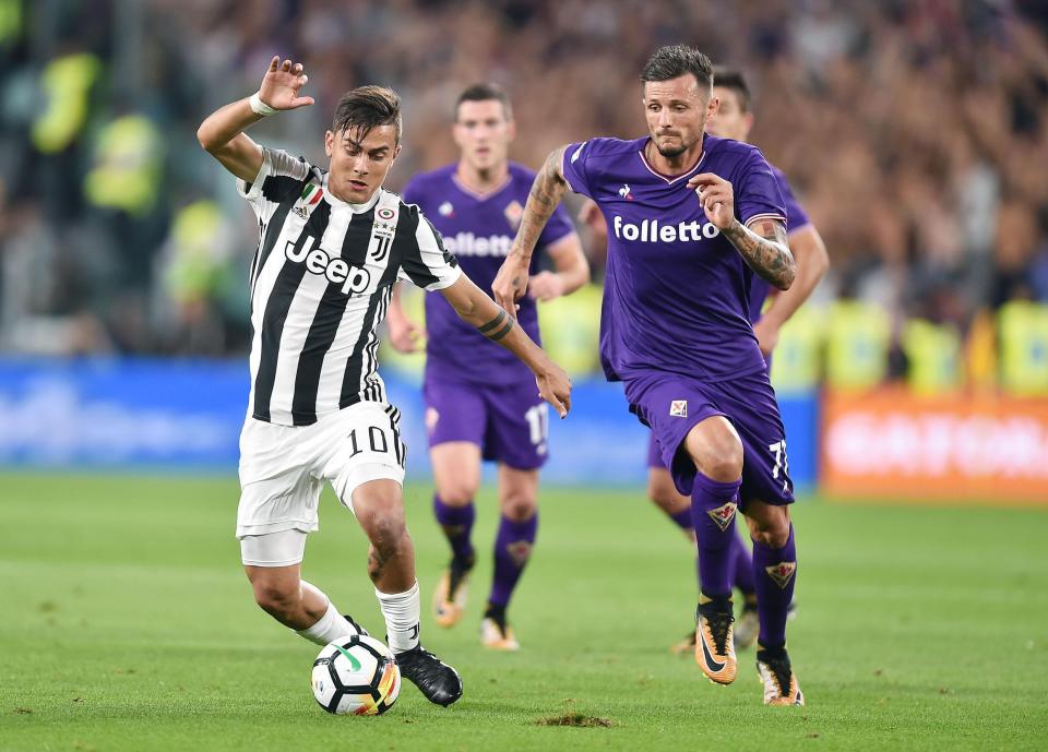  Juventus striker Paulo Dybala, left, is a target for Barcelona