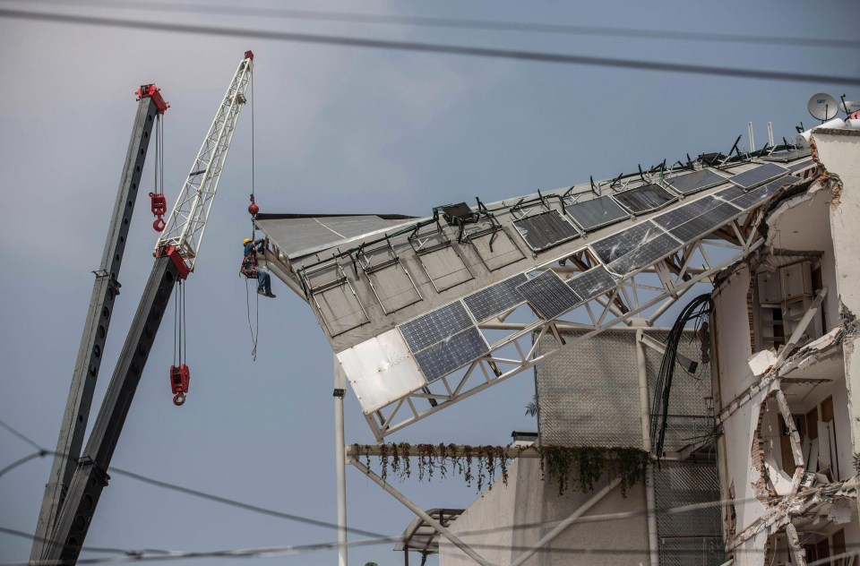 Rescue workers search for trapped victims after President Peña Nieto said ‘every minute saves lives’