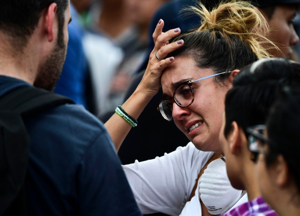 Worried parents gathered to hear news of missing children at the site of the school