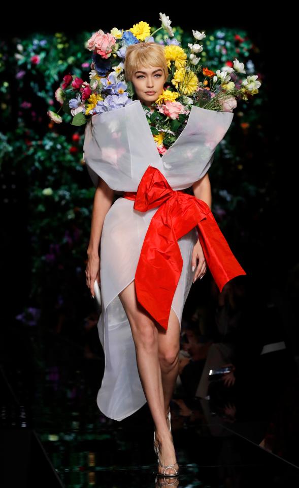  Gigi Hadid wore one of Moschino's most daring designs on the catwalk tonight in Milan