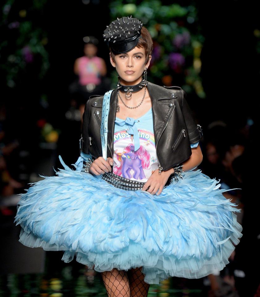  Which the teenage model wore with confidence as she worked her magic on the runway