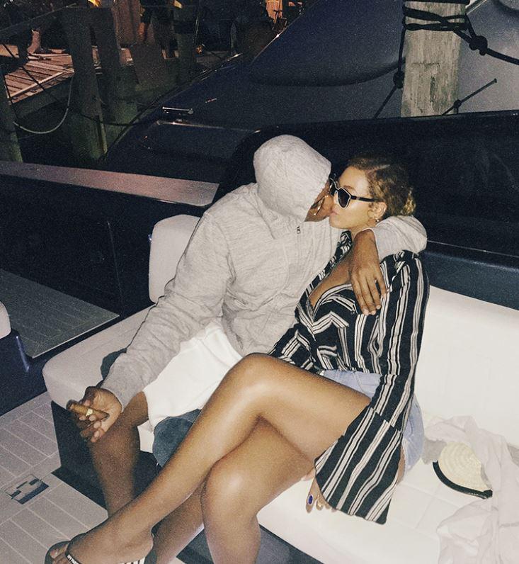  Beyonce and Jay Z look loved up on holiday in the latest snap on her website