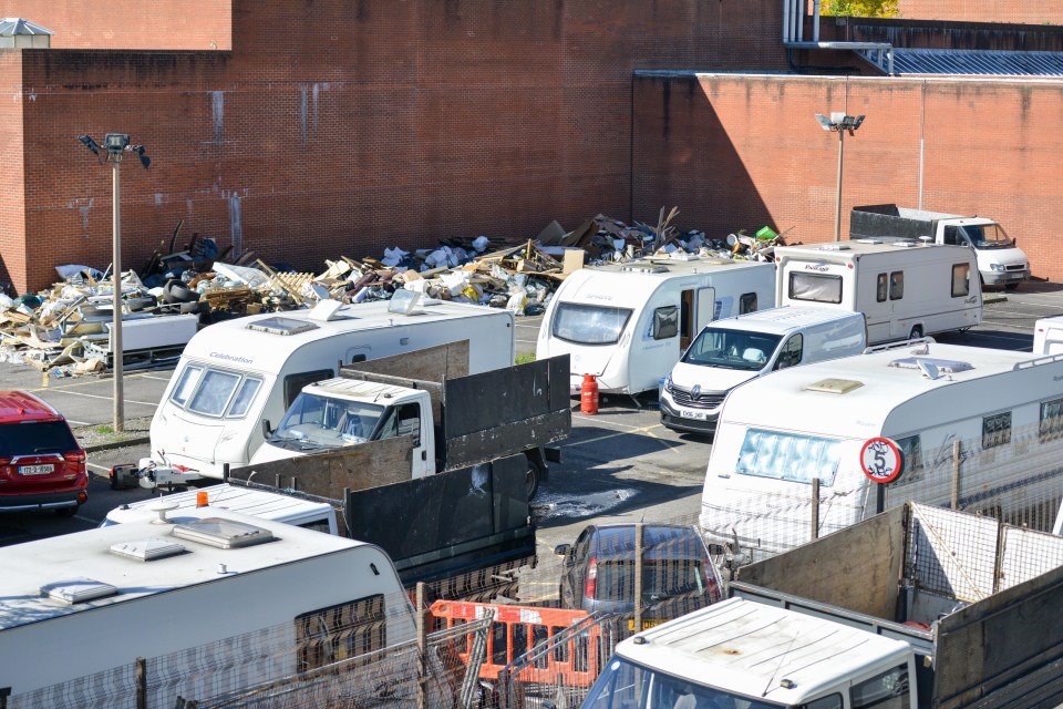 There are now at least 20 vehicles at the car park next to Holloway Prison