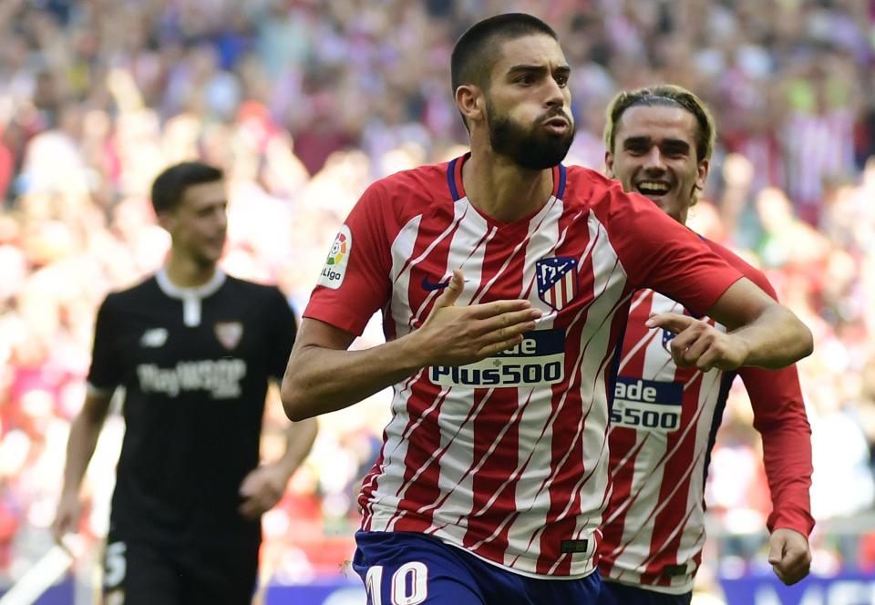  Yannick Carrasco celebrates after giving Atletico Madrid the lead