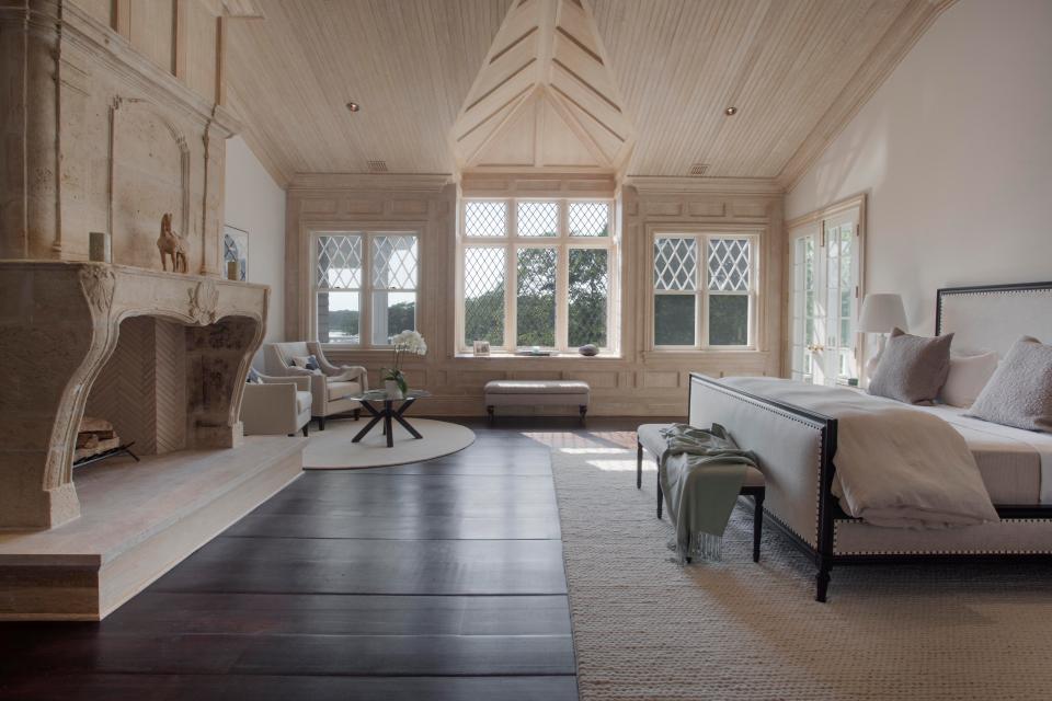  The master bedroom is set in the eaves of the palatial property