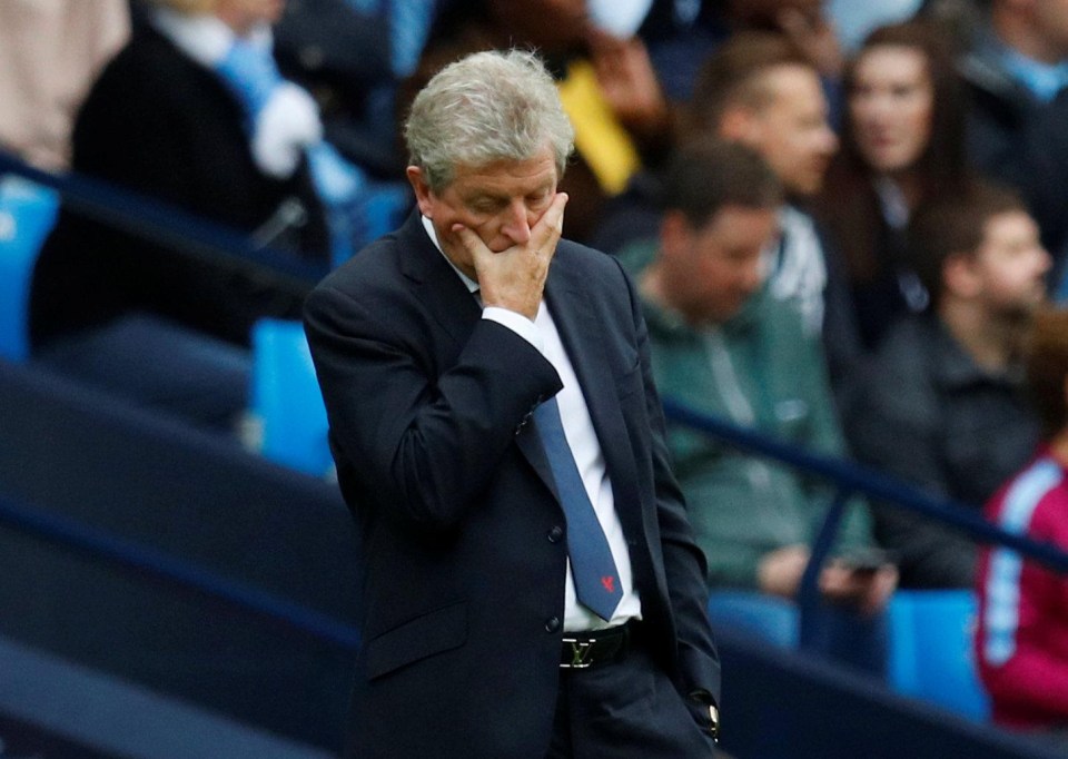 Roy Hodgson looks dejected as City score their 5th goal of the game