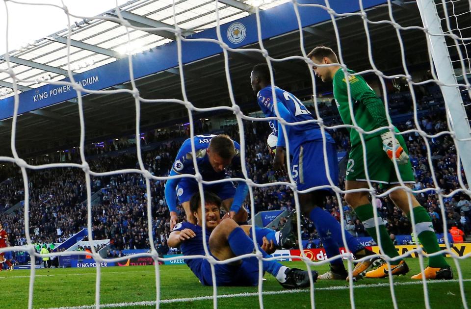  Shinji Okazaki picked up a knock after bundling the ball into the net