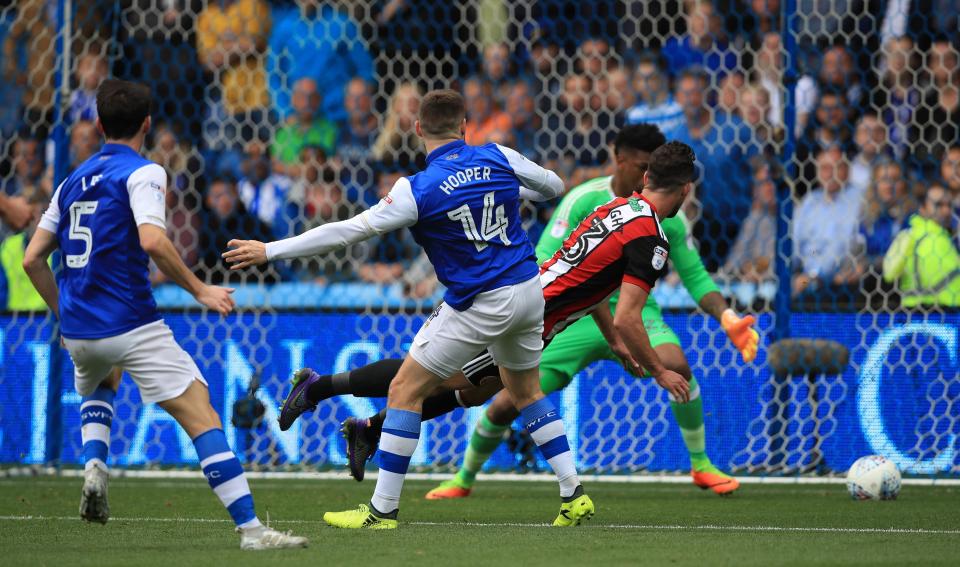  Gary Hooper pulled one back for Sheffield Wednesday before the break