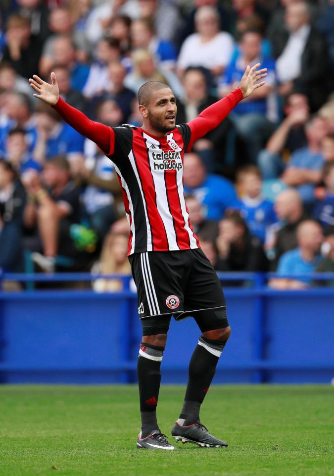  Leon Clarke celebrates after putting Sheffield United 4-2 up against Sheffield Wednesday