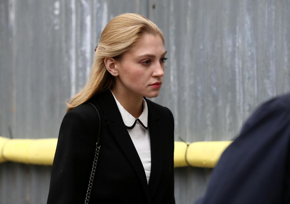  She had earlier looked downbeat as she arrived at court awaiting sentencing for stabbing her boyfriend with a bread knife in a drink and drug-fuelled rage