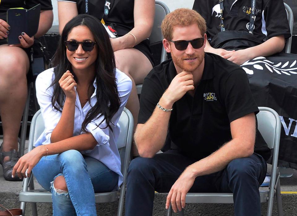  Meghan dazzled as she joined boyfriend Prince Harry at the match, having admitted the couple were 'in love'