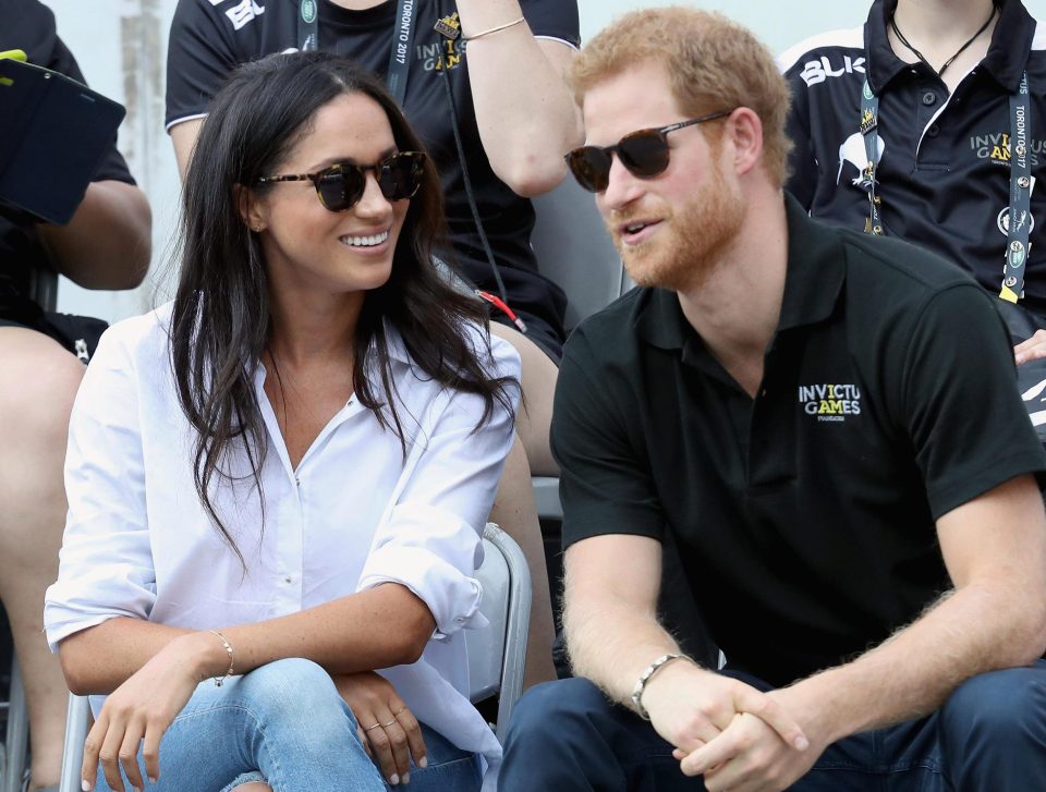  The couple couldn't keep the smiles off their faces as they finally got to sit together