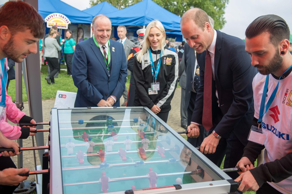 The prince joined a game of table football with a mental health service attached to MK Dons