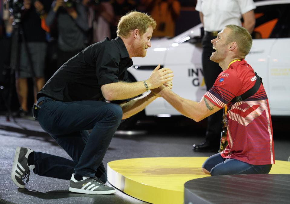  Prince Harry congratulated a former marine on taking silver at the Invictus Games