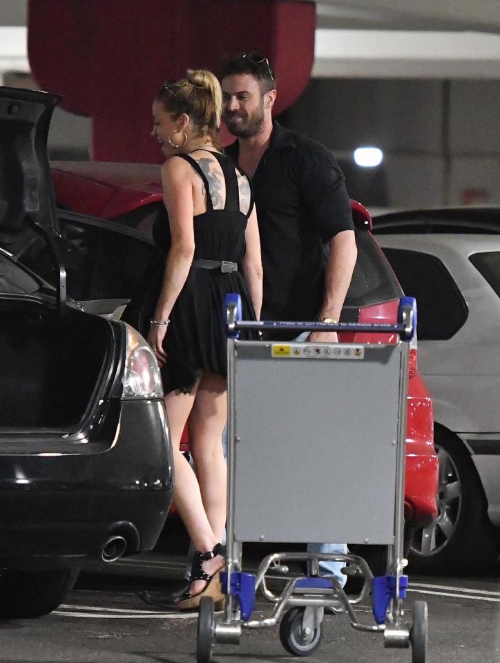  Sarah and Chad giggle as they head off into LA together