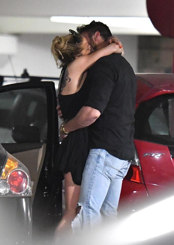  Sarah grabbed Chad as he held her tight to him - following rumours they'd split