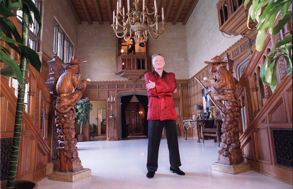 Hef is seen inside the Holmby Hills mansion he put up for sale for $27million in 1999