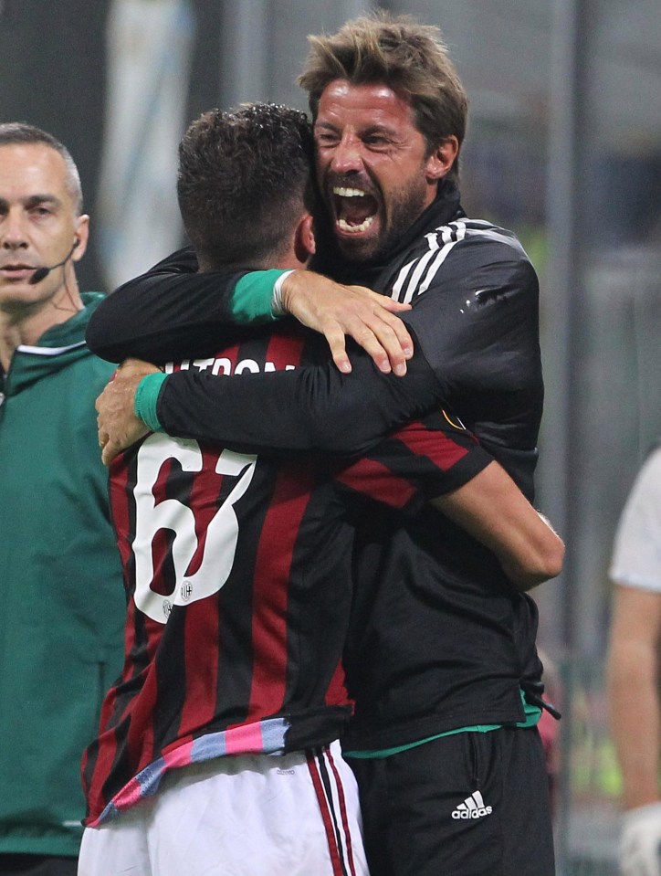 The 19-year-old and Marco Storari embrace after the last-gasp goal in the Europa League clash