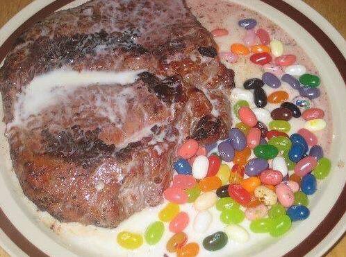  This questionable dish shows a slab of meat with a side portion of jelly babies