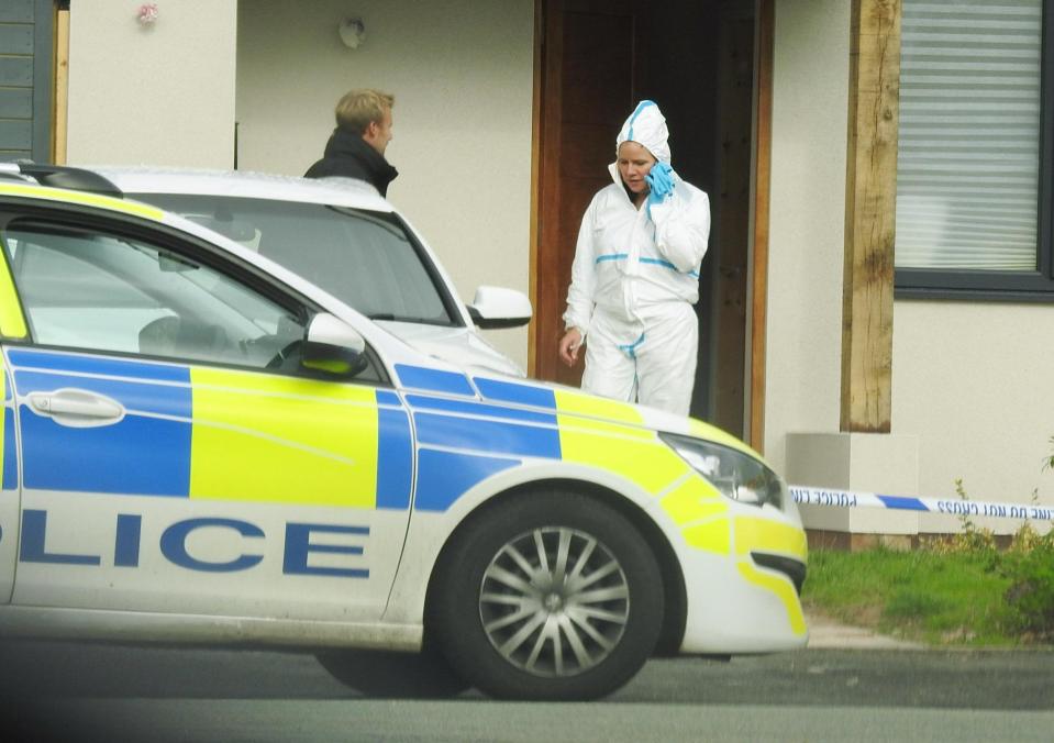  Forensics officers were pictured at the family home in Wilmslow today after Leanne's body was found in a Cheshire lake