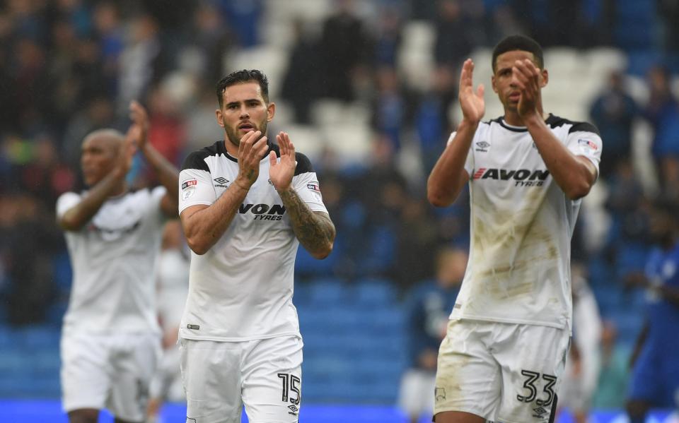  Derby duo Curtis Davies and Bradley Johnson applaud the travelling supporters after the full-time whistle